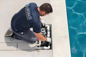 Man Repairing Pool Equipment